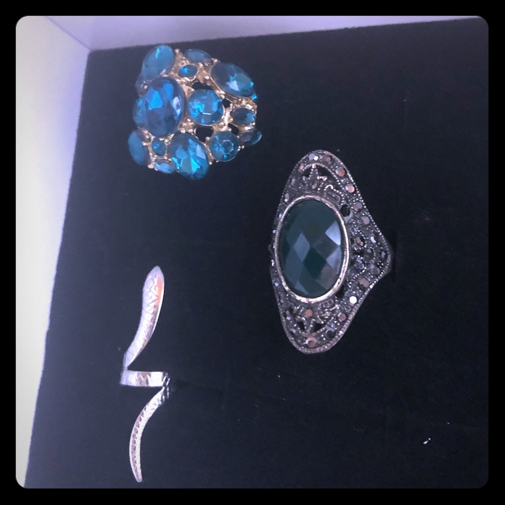 2 statement rings.